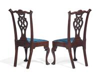 A Pair of Chippendale Carved Walnut Side Chairs
