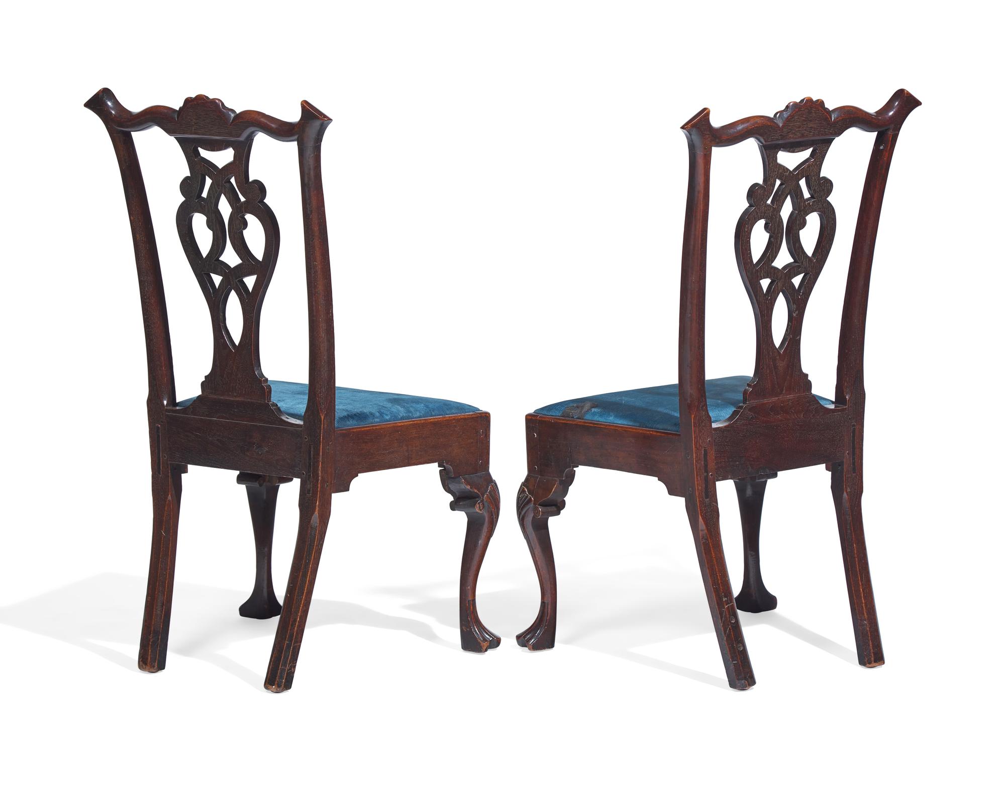 A Pair of Chippendale Carved Walnut Side Chairs
