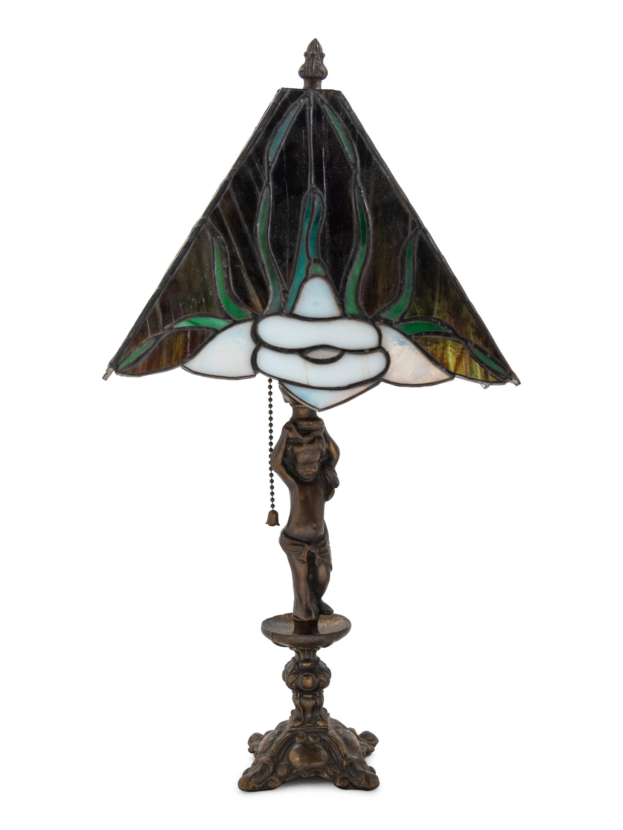 An American Leaded Glass and Cast Metal Figural Lamp