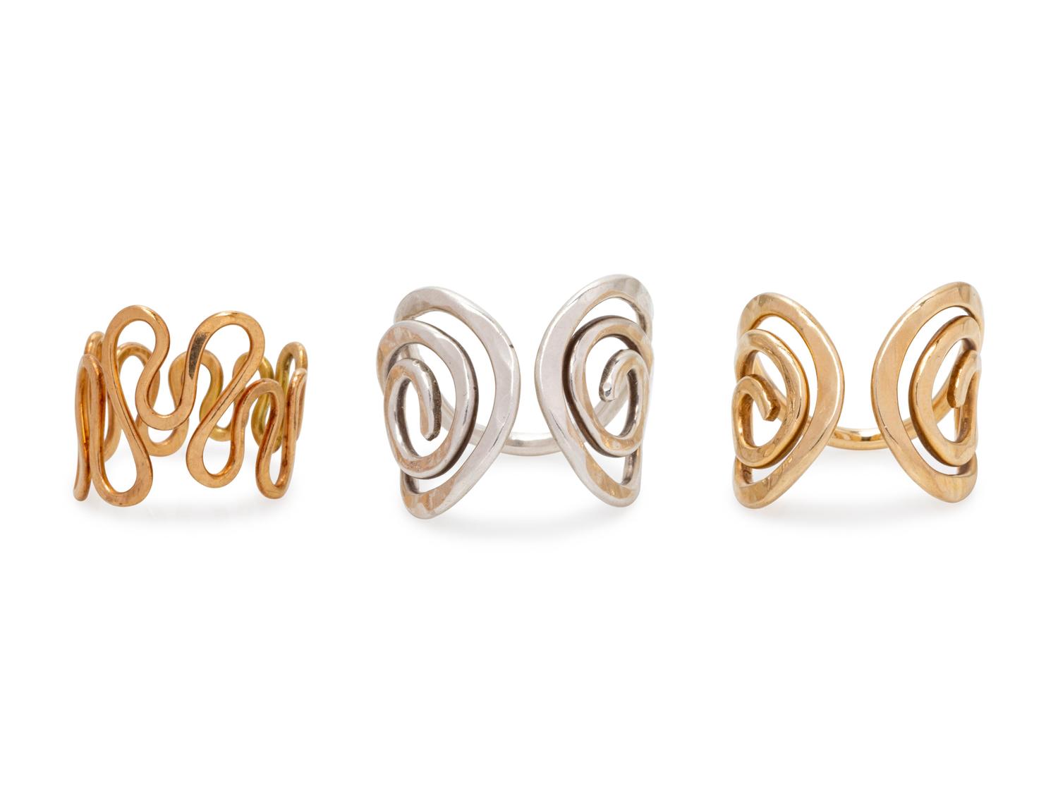 A Collection of Curvy Wire Rings, Calf & Dragon,