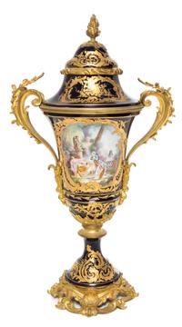 A Sevres Gilt Bronze Mounted Porcelain Urn Height 26 1/4 inches.