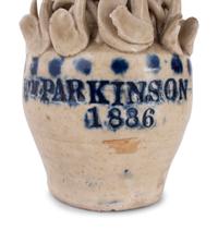 A Pair of Cobalt Decorated Stoneware Puzzle Banks