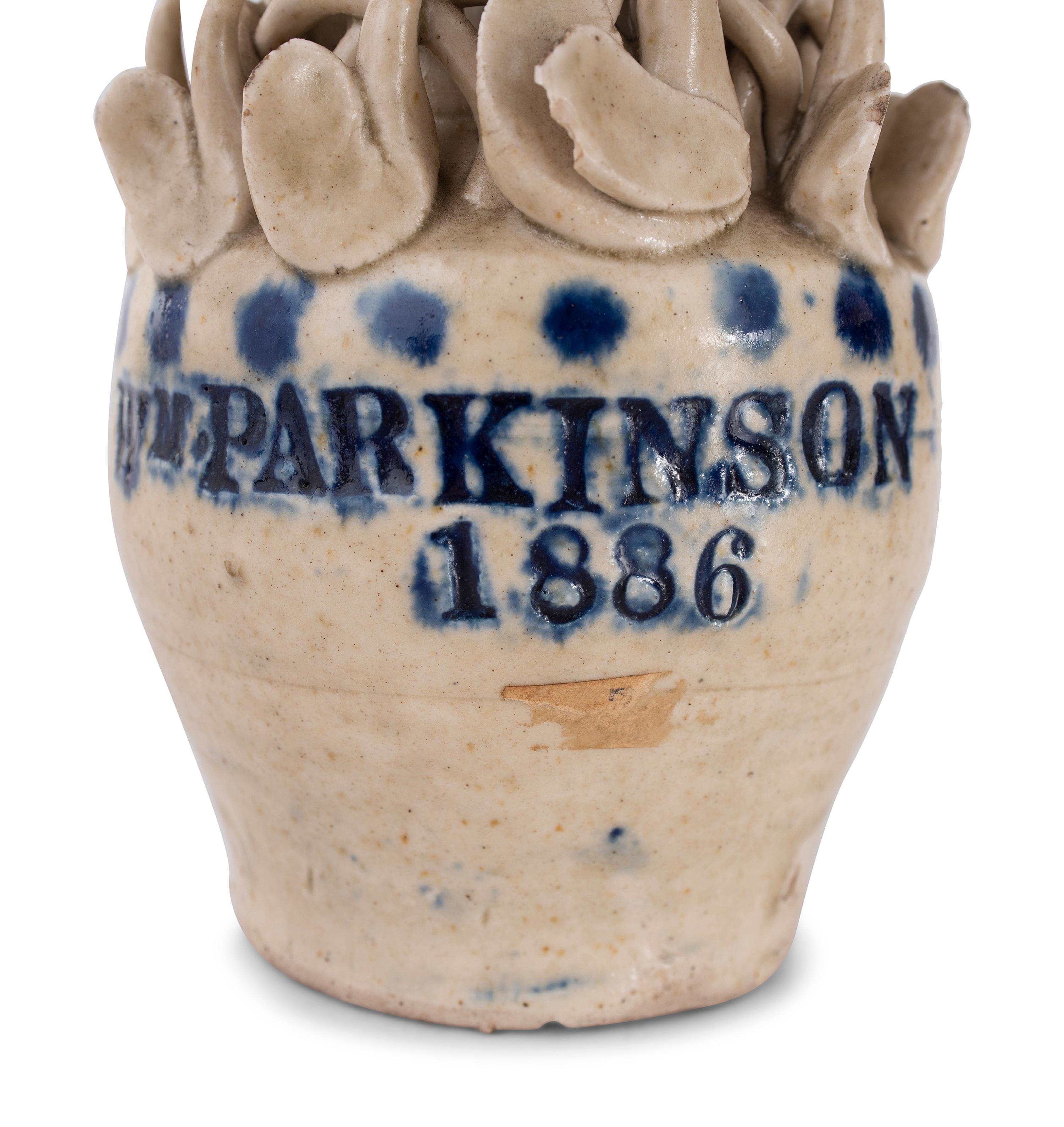 A Pair of Cobalt Decorated Stoneware Puzzle Banks