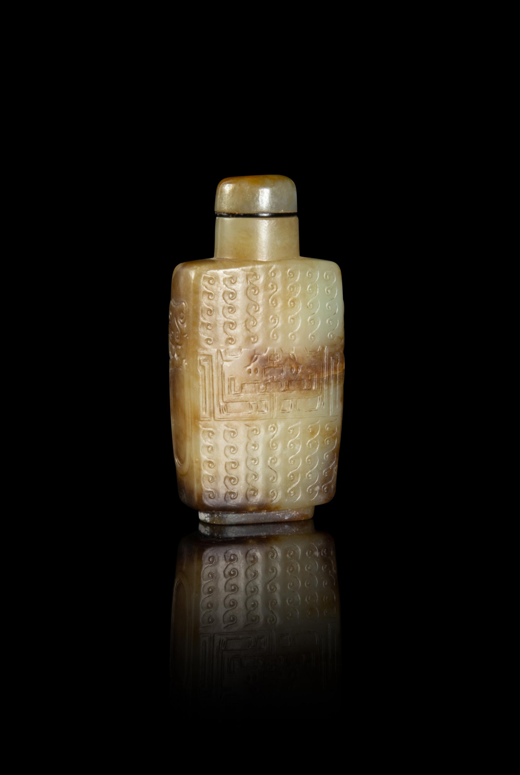 A Russet and Celadon Jade 'Kuilong' Snuff Bottle