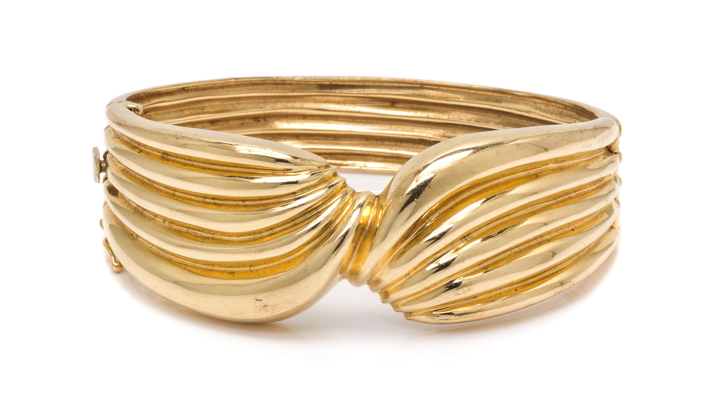 A 14 Karat Yellow Gold Bangle Bracelet, 30.30 dwts.