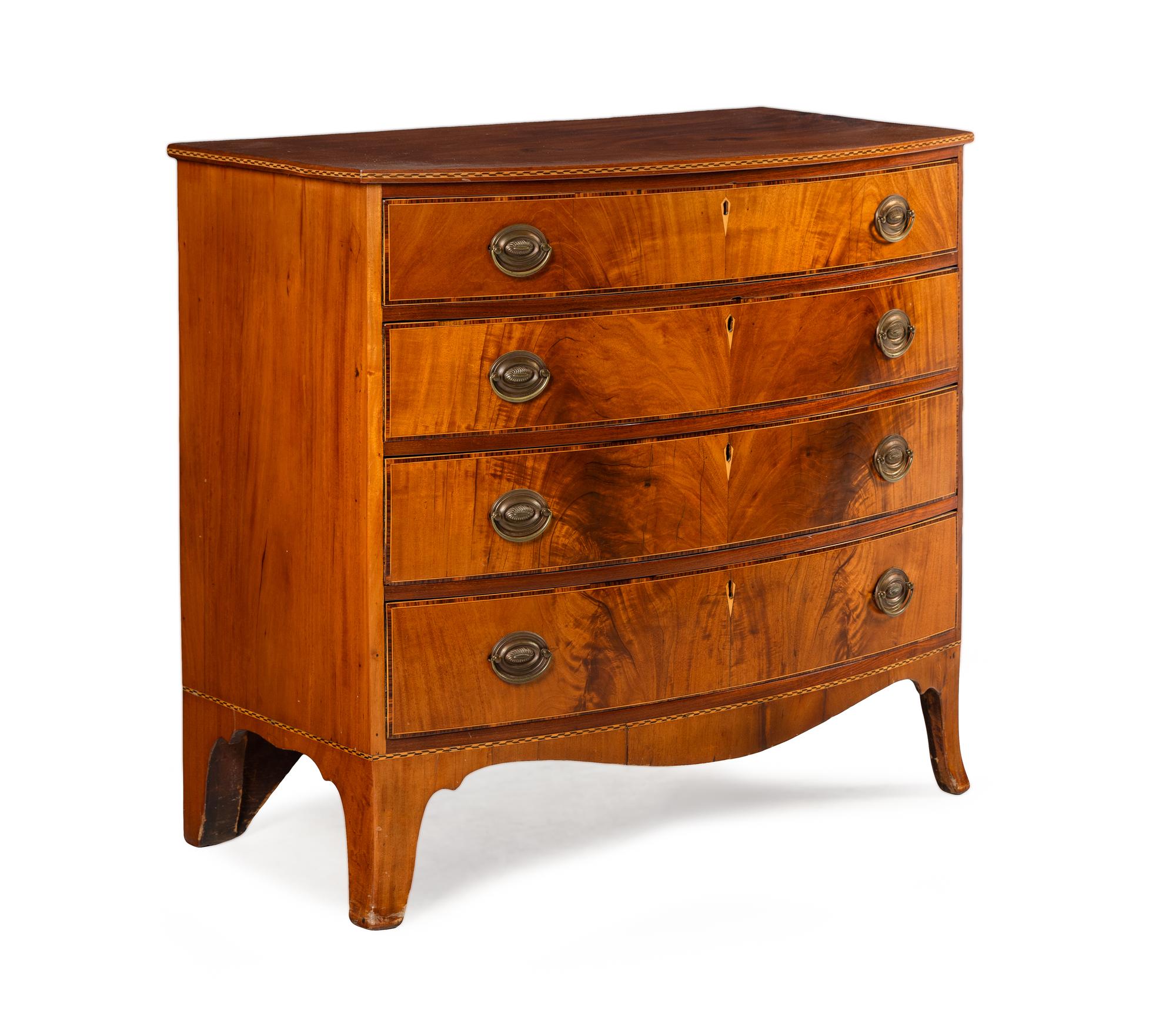A Federal Inlaid and Figured Mahogany Bow-Front Chest of Drawers