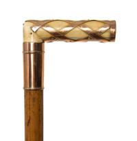 An American Ivory and 14 Karat Gold Handled Cane, Length of handle 2 1/2 x length overall 35 inches.