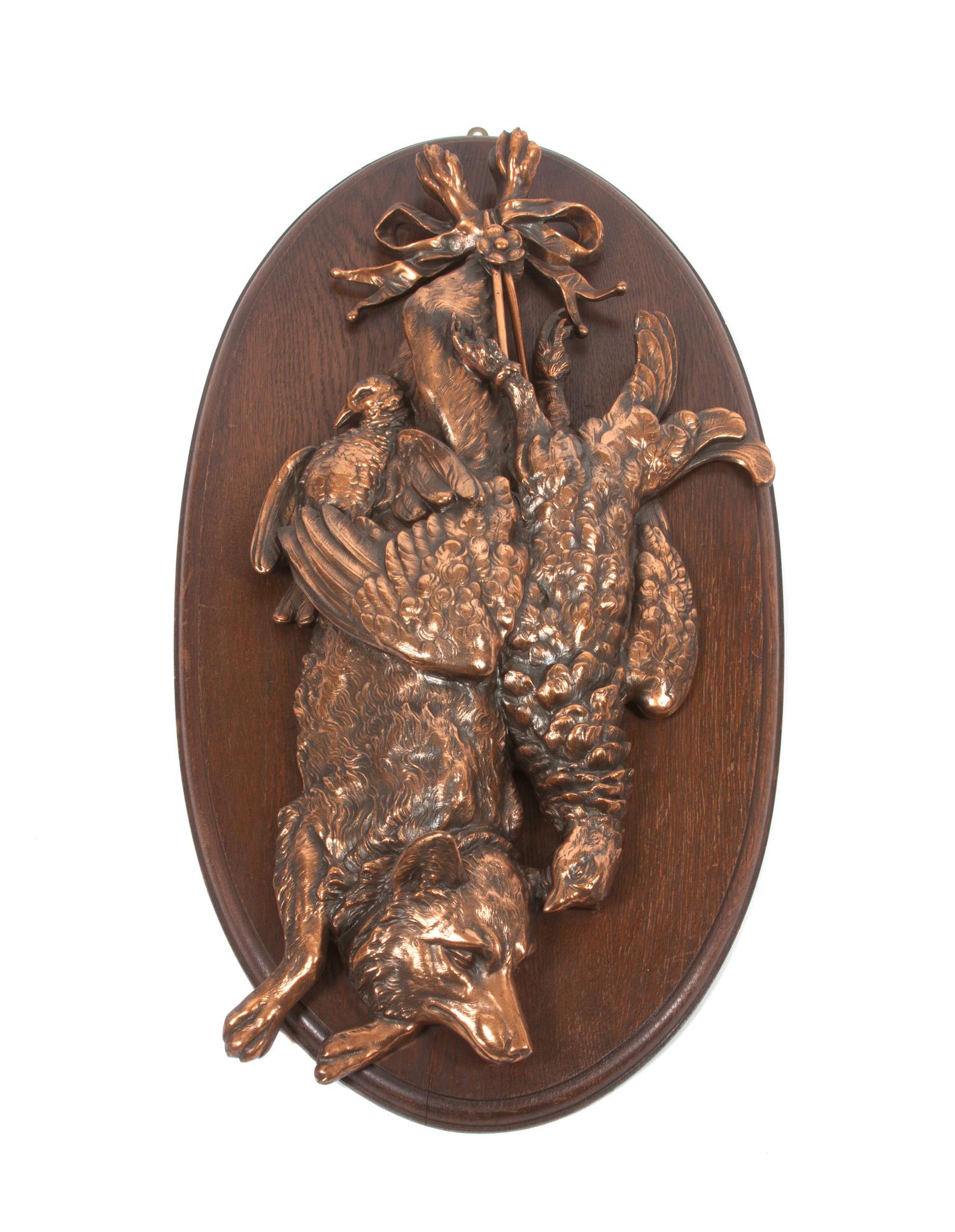 A Pair of Copper or Brass Game Mounts Height overall 31 x width 16 inches.