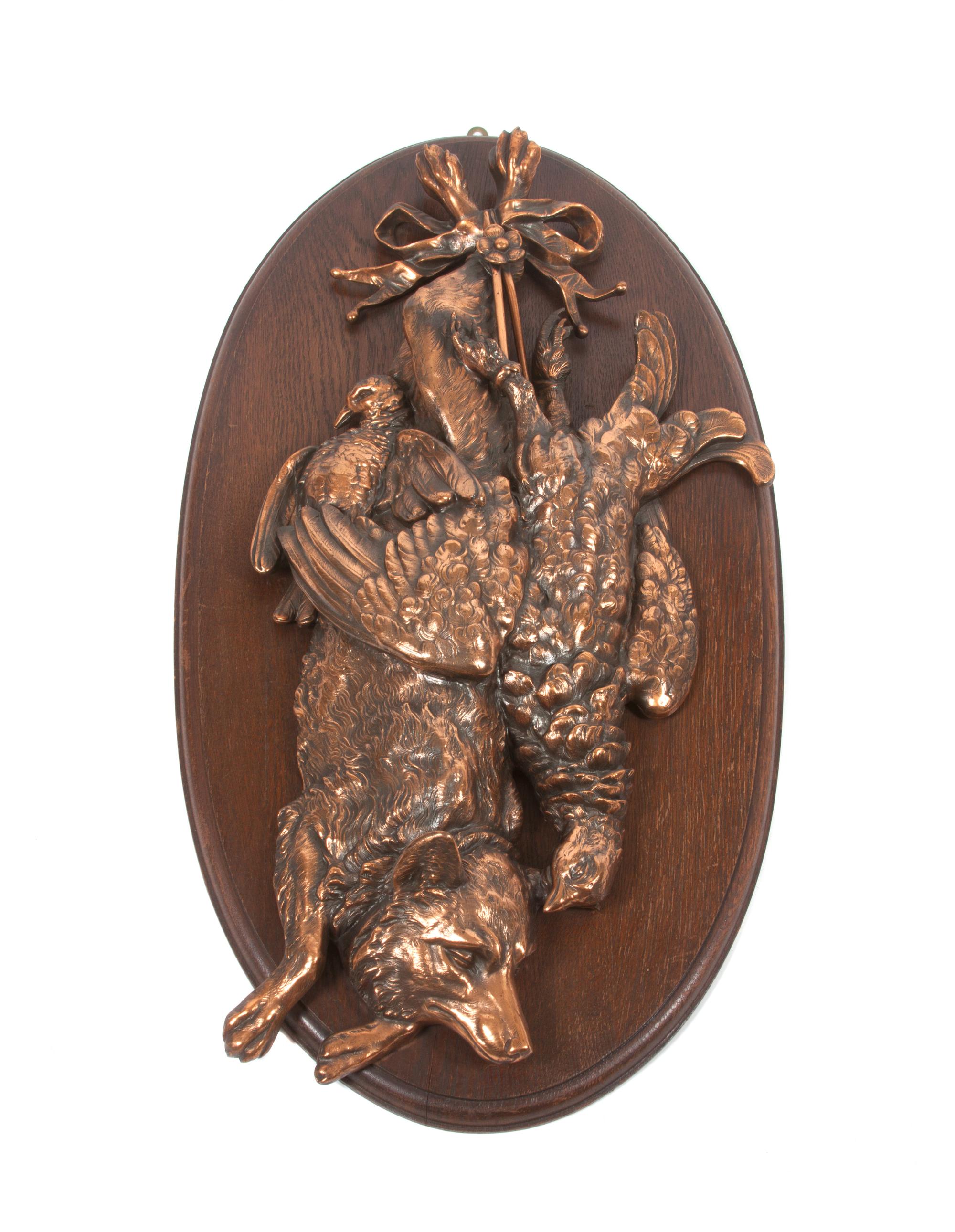 A Pair of Copper or Brass Game Mounts Height overall 31 x width 16 inches.