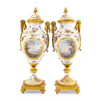 A Pair of Sèvres Style Porcelain and Gilt Bronze Mounted Urns