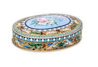 A Russian Silver-Gilt and Enamel Snuff Box, Mark of Ivan Saltykov, Moscow, late 19th century, of oval form, the lid centered by an enam
