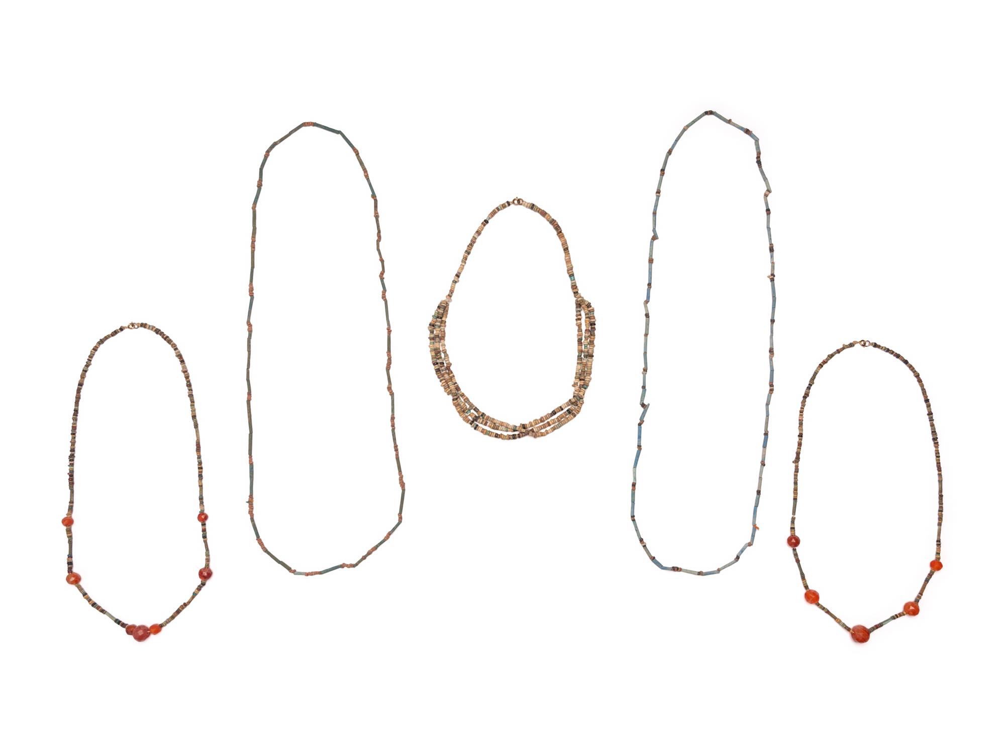 Five Egyptian Carnelian, Shell, and Ceramic Necklaces