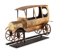 A Gilt, Cut, and Pressed Sheet Metal Automobile Weathervane