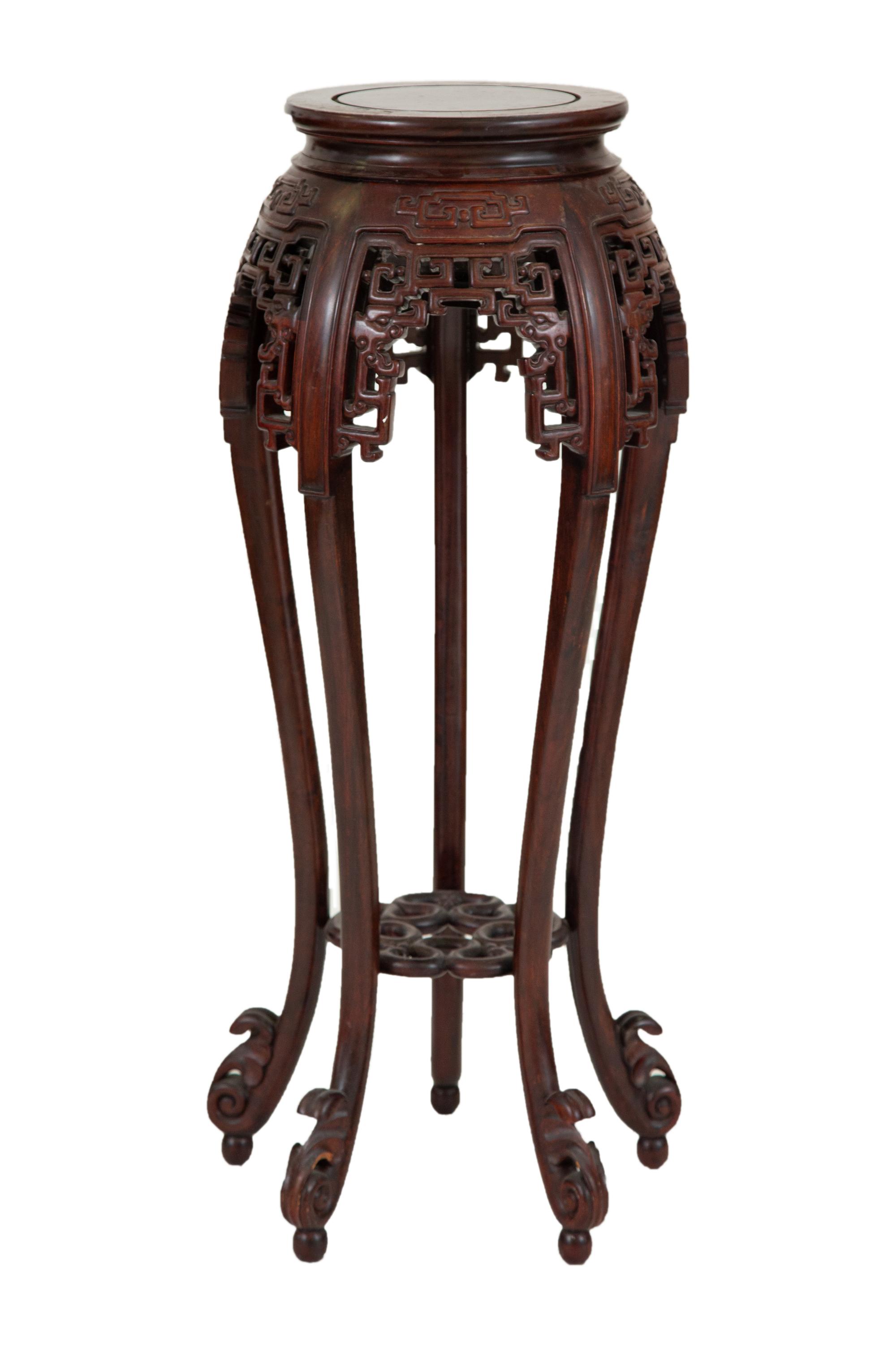 A Chinese Carved Rosewood Jardinière Stand