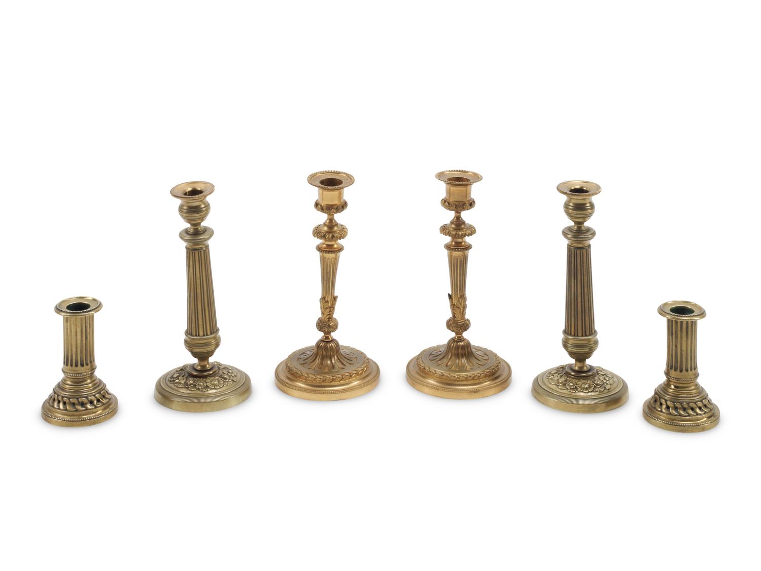 Three Pairs of French Gilt Bronze Candlesticks