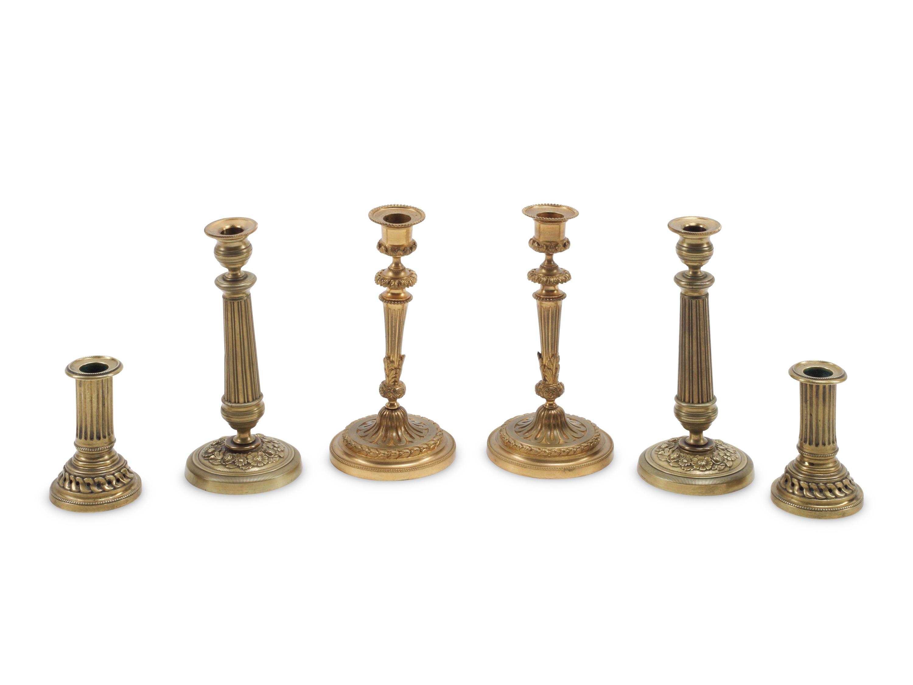 Three Pairs of French Gilt Bronze Candlesticks