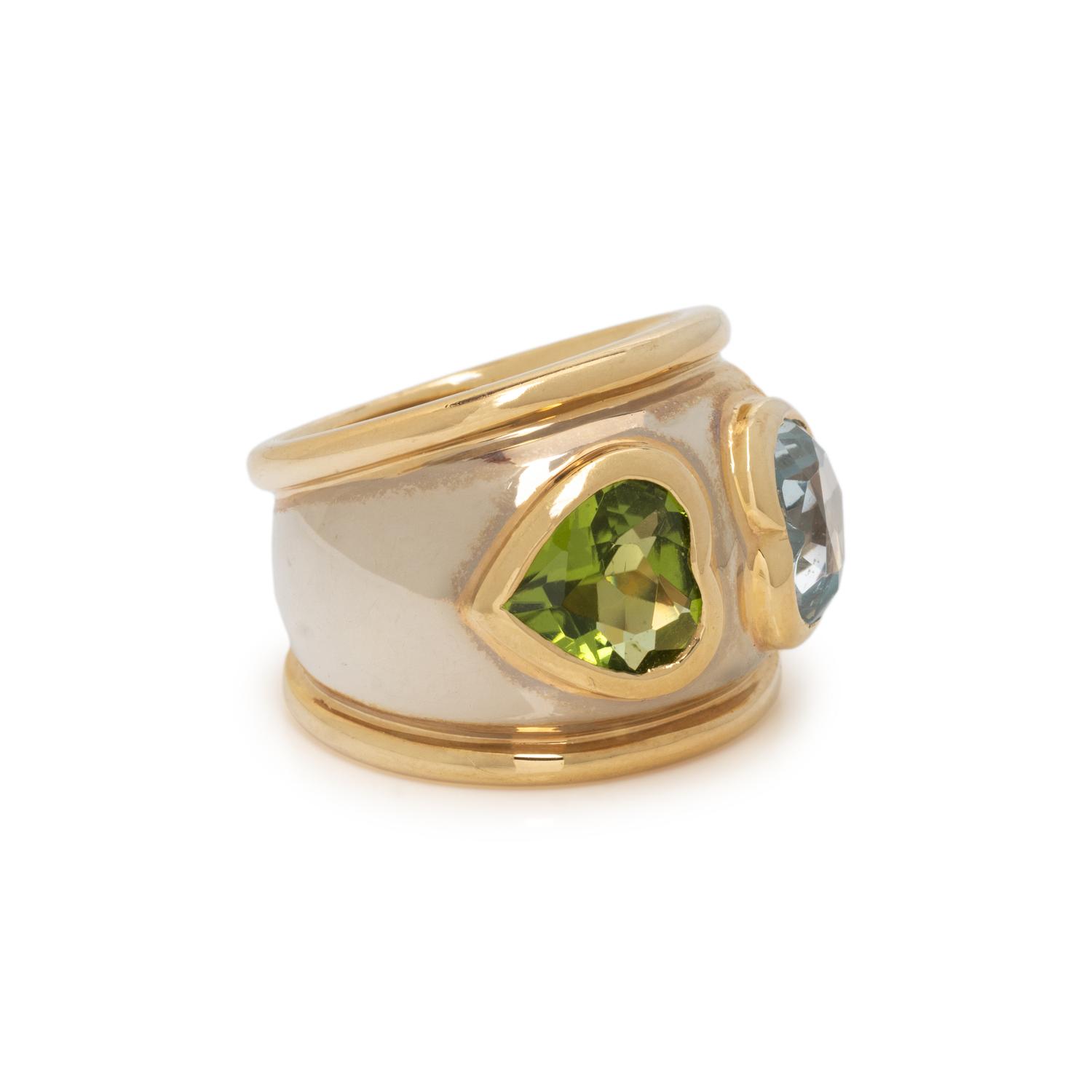 PERIDOT, BLUE TOPAZ, AND BICOLOR GOLD RING