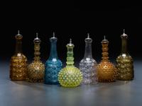 Seven Glass Barber Bottles