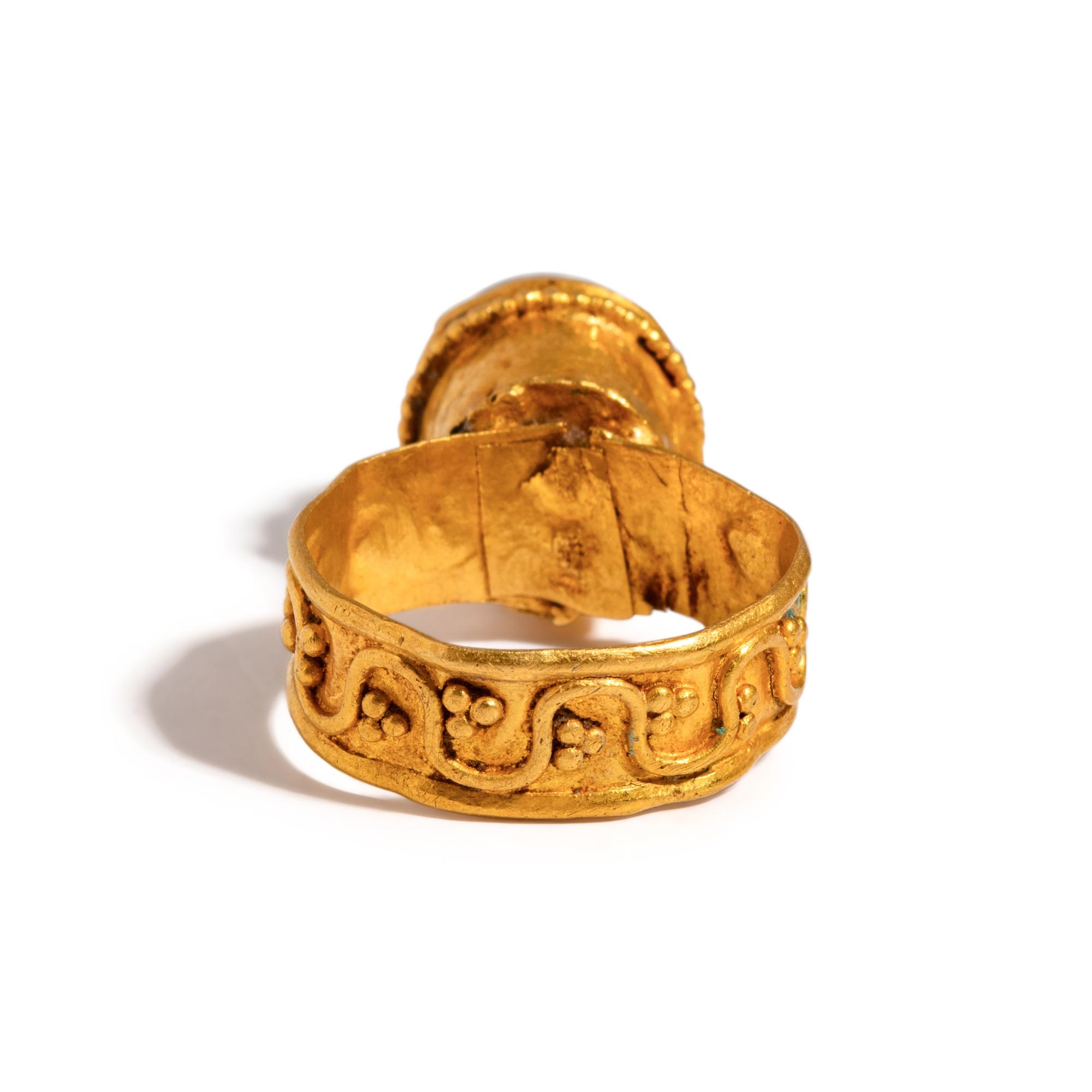 A Byzantine Garnet and Gold Domed Finger Ring