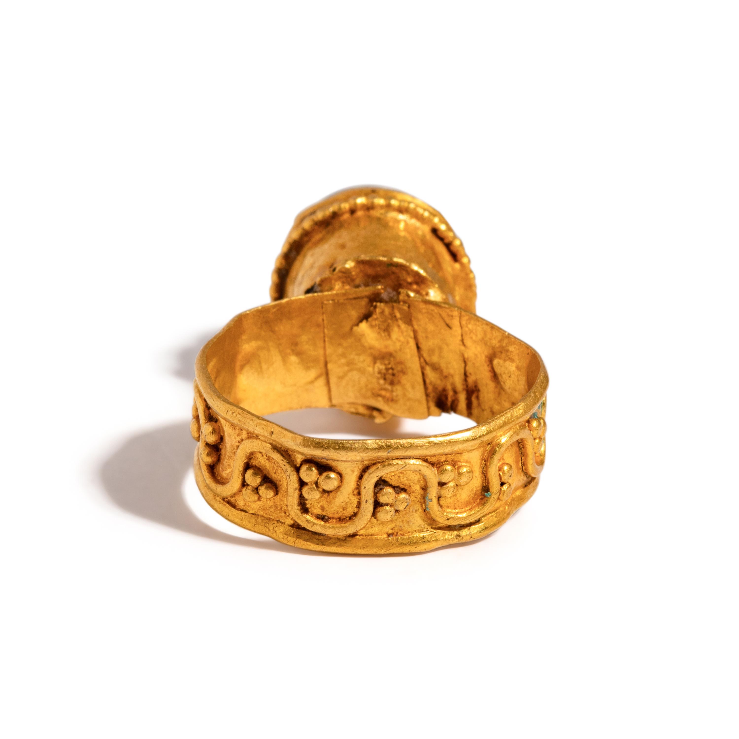 A Byzantine Garnet and Gold Domed Finger Ring