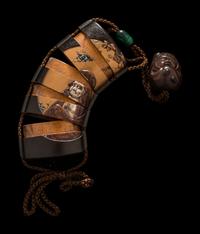 A Japanese Gold and Black Lacquer Four-Case Inro