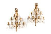 A Pair of Louis XVI Style Gilt Bronze and Cut Glass Nine-Light Sconces