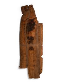 An Egyptian Painted Wood Sarcophagus Panel with Isis