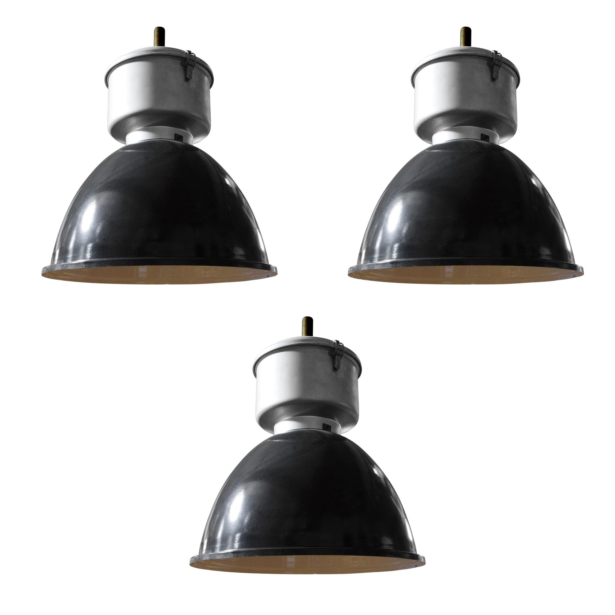 A Set of Three Enameled Steel Industrial Light Fixtures 18.5" W x 18.5" D x 23" H — United States, Circa 1950