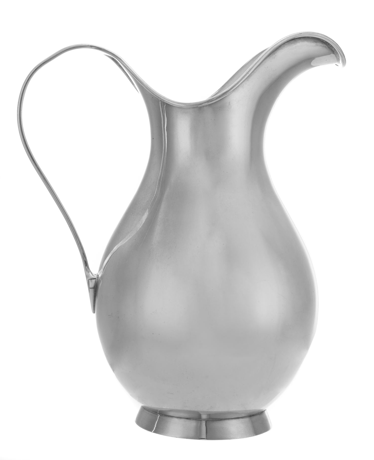 A Danish Silver Pitcher, Kay Fisker for A. Michelsen, Copenhagen, of baluster form, raised on a flared foot.