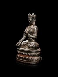 A Sino-Tibetan Bronze Figure of a Seated Crowned Buddha