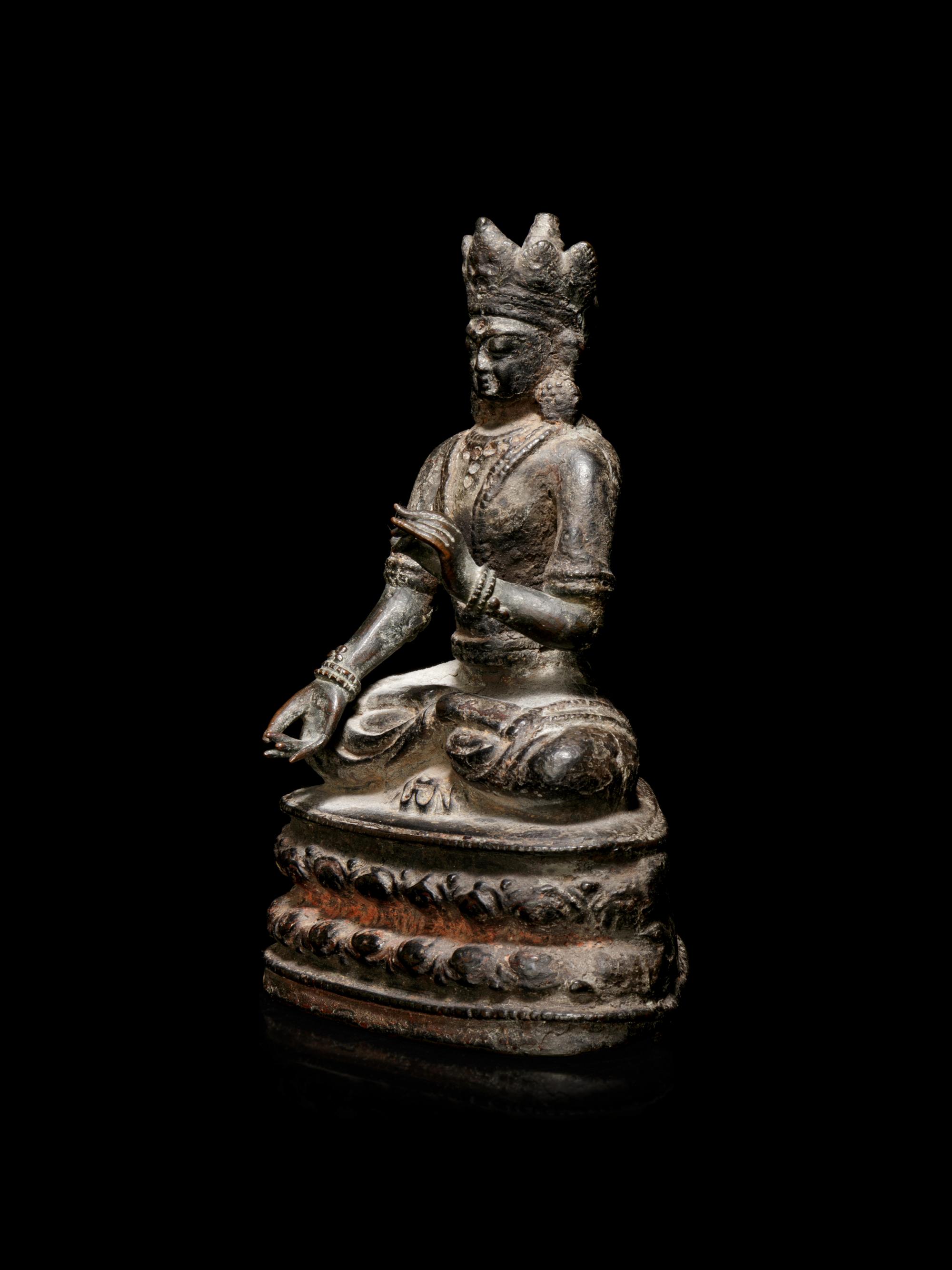 A Sino-Tibetan Bronze Figure of a Seated Crowned Buddha