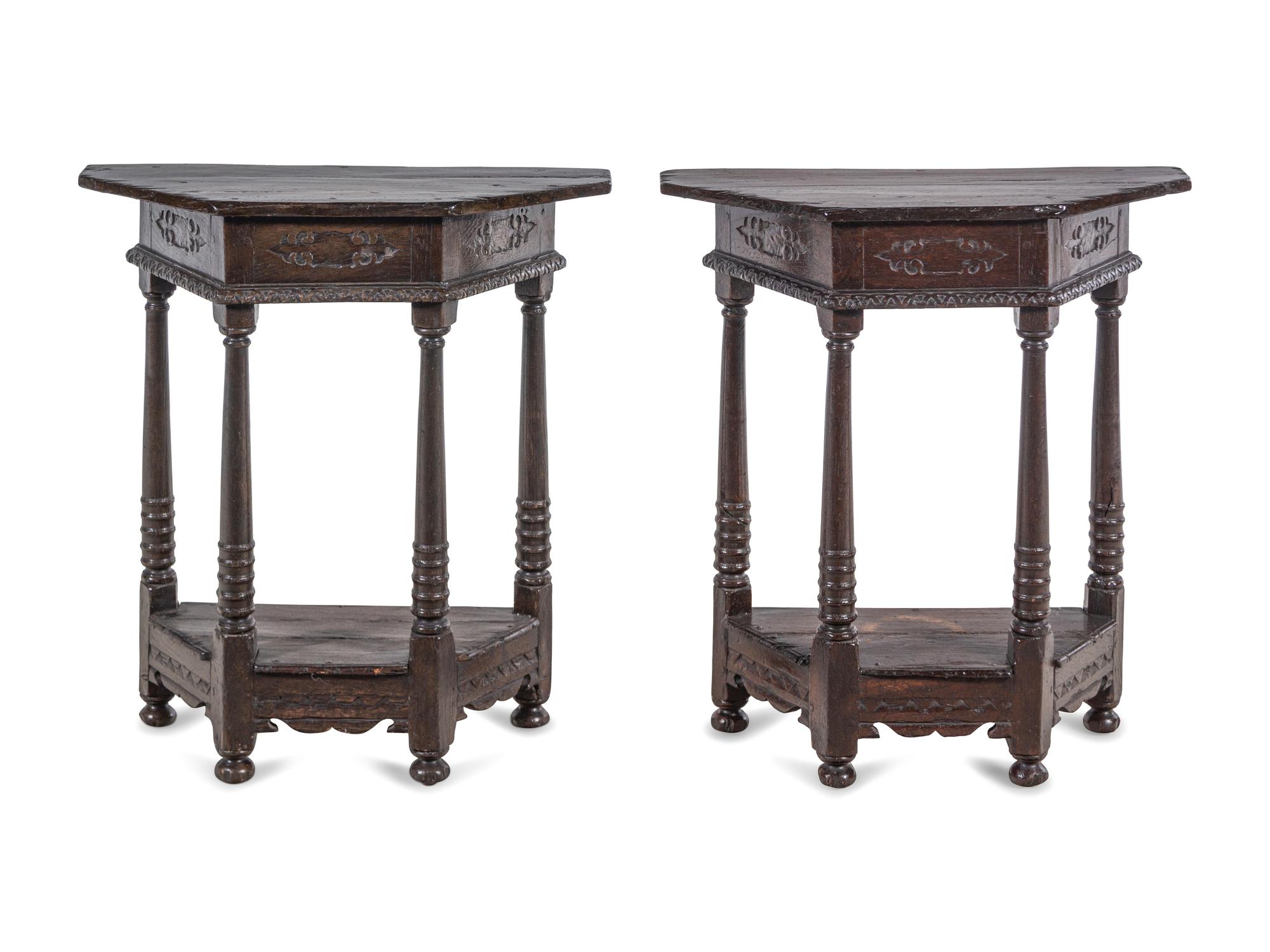 A Pair of Continental Carved Oak Console Tables