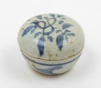 A Small Blue and White Circular Covered Box Diameter 2 1/2 inches.