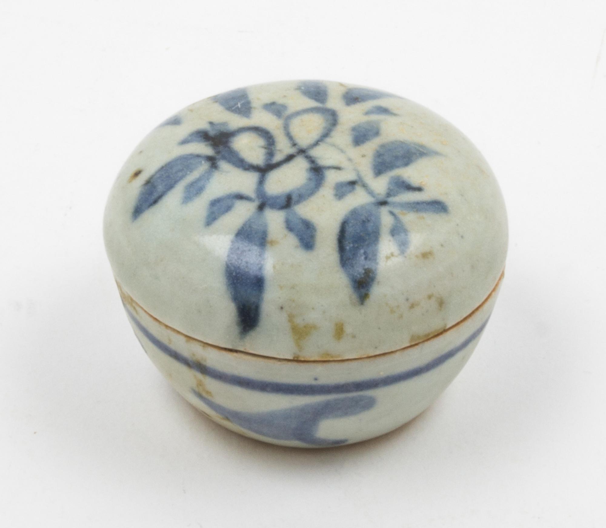 A Small Blue and White Circular Covered Box Diameter 2 1/2 inches.