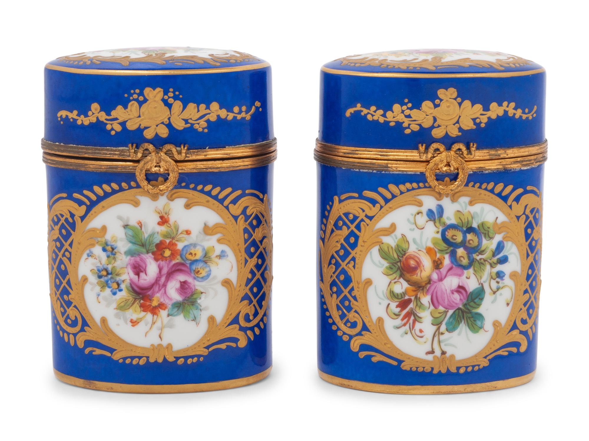 A Pair of Sèvres Style Porcelain Oviform Jars