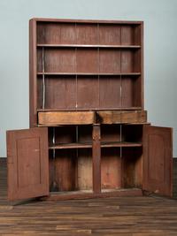 A Country Red Painted Pine Step-Back Pewter Cupboard
