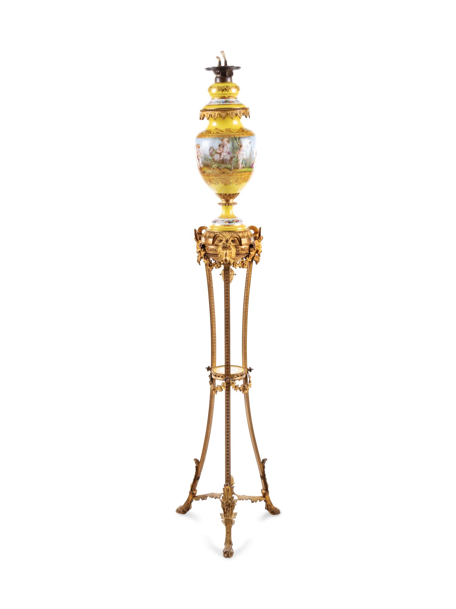 A Sèvres Style Gilt Bronze Mounted Painted and Parcel Gilt Porcelain Banquet Lamp