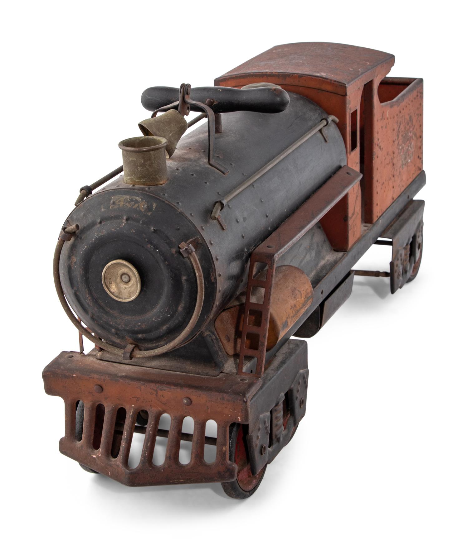 A Group of Five Metal Toys