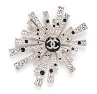 A Chanel Rhinestone Starburst Brooch, 3.5" x 4".