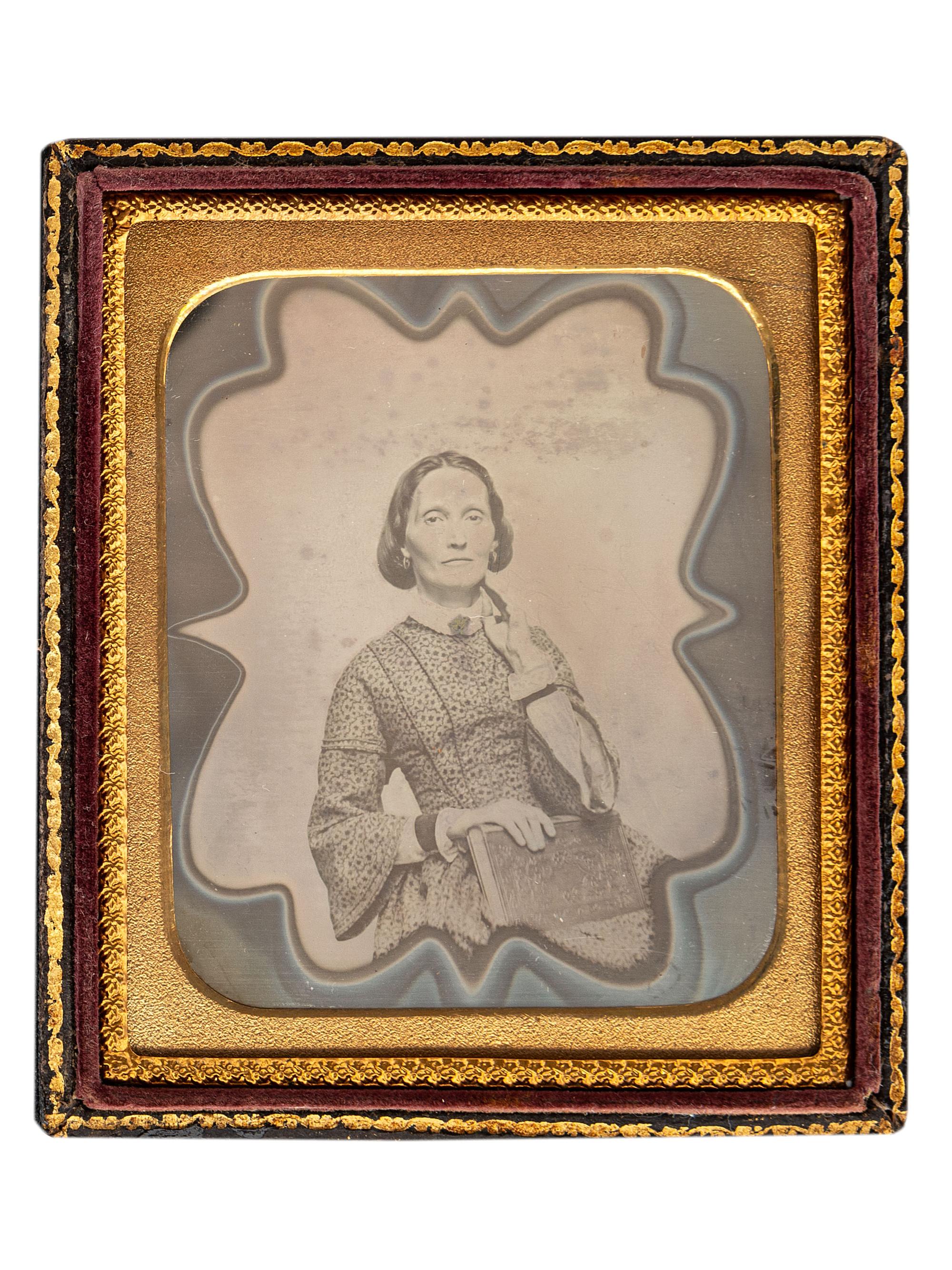 [EARLY PHOTOGRAPHY]. A collection of 11 daguerreotypes featuring artistic borders, including: