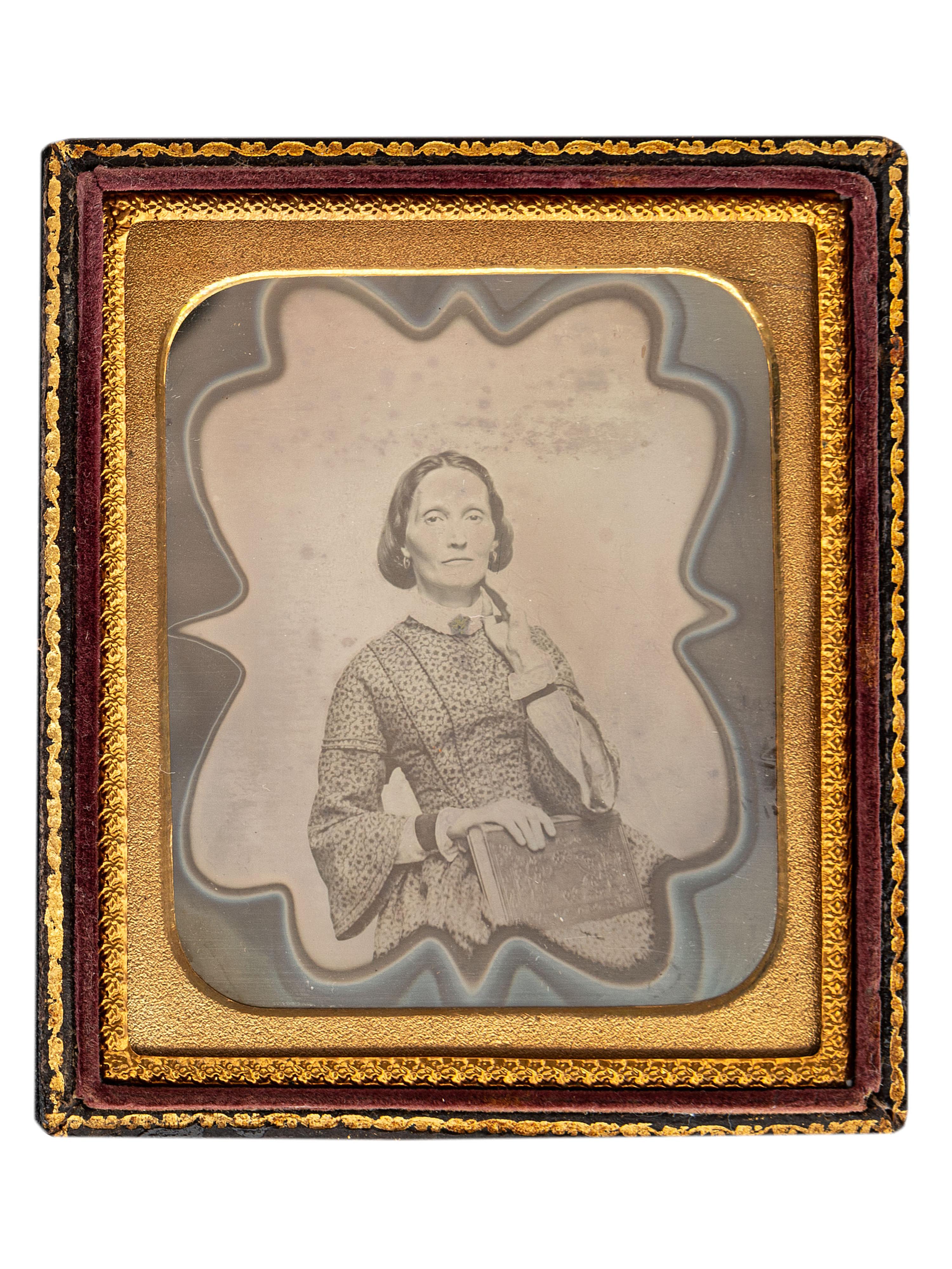 [EARLY PHOTOGRAPHY]. A collection of 11 daguerreotypes featuring artistic borders, including: