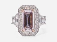 A Platinum, Rose Gold, Pink Diamond, and Diamond Ring