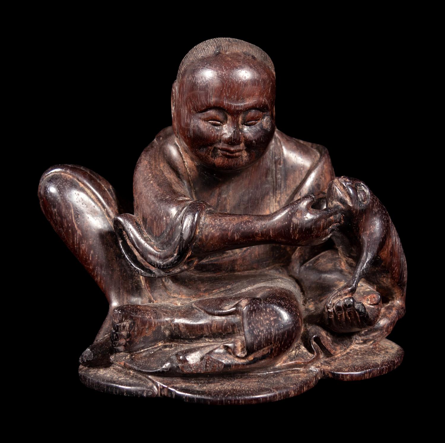 A Carved Zitan Wood Figural Group of Liu Hai and Three-Legged Toad