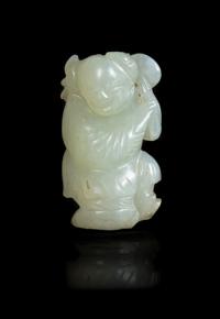 A Chinese Pale Celadon Jade Figure of a Boy Height 1 7/8 inches. — 18TH/19TH CENTURY