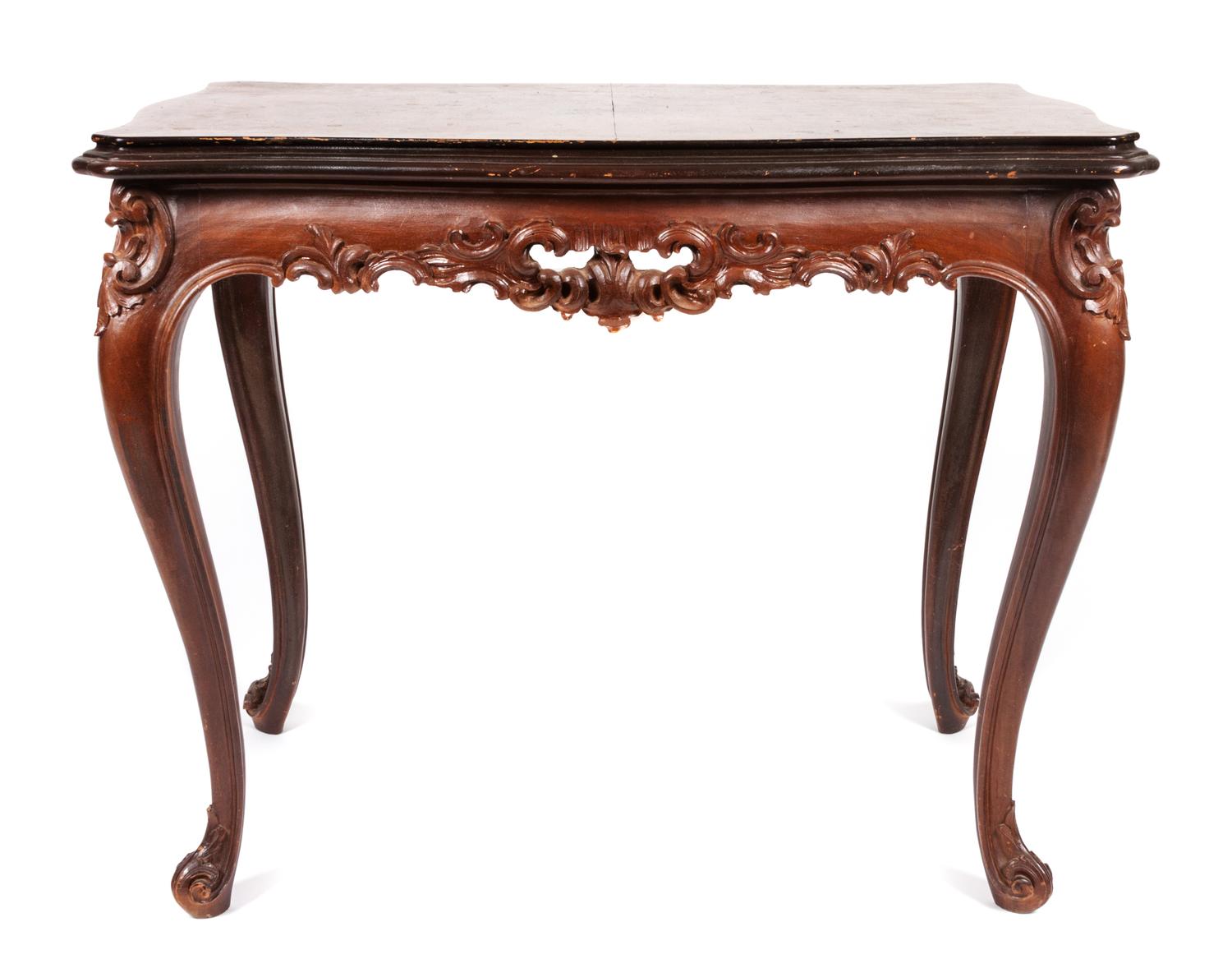 A Louis XV Style Carved Occasional Table Height 23 1/2 x width 29 1/2 x depth 19 1/4 inches.