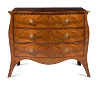 A George III Mahogany Serpentine Commode