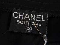 A Pair of Chanel Silk Short Sleeve Blouses,