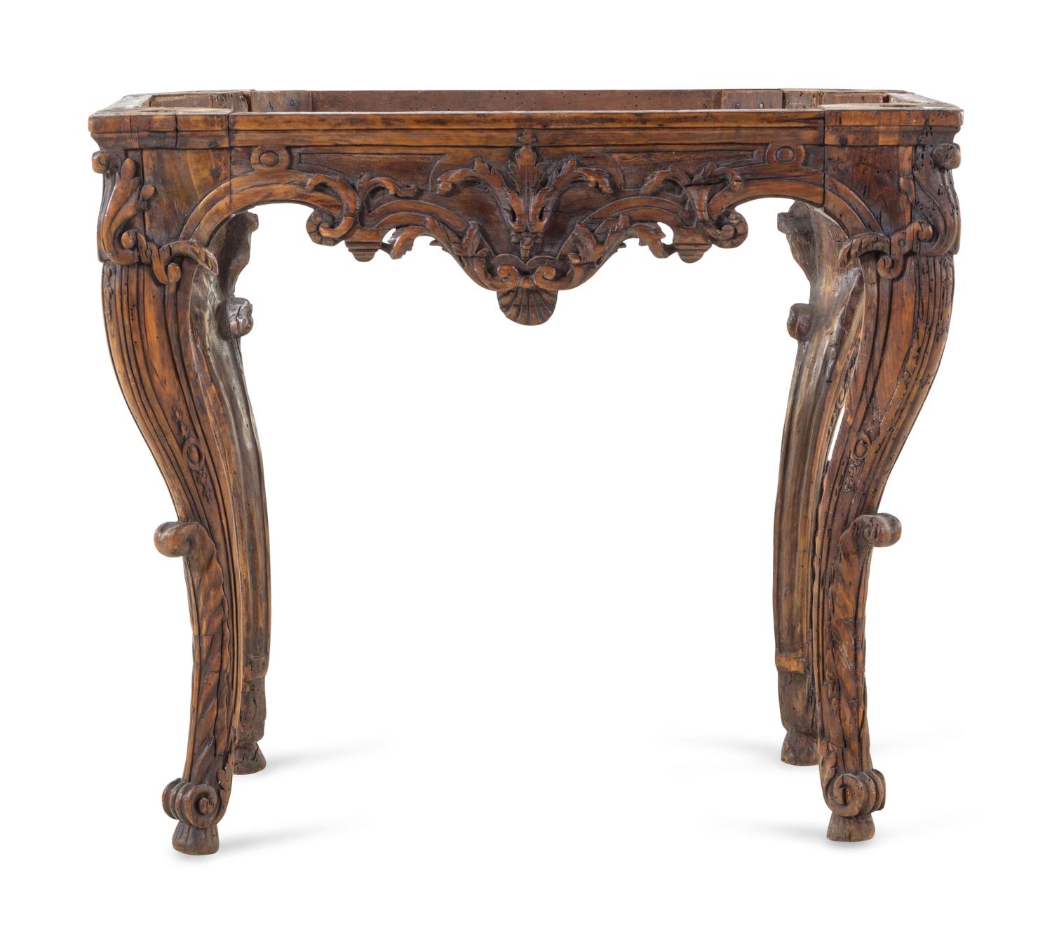 An Italian or French Carved Fruitwood Table