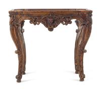 An Italian or French Carved Fruitwood Table