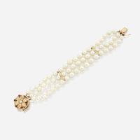 A collection of two cultured pearl necklaces and one bracelet
